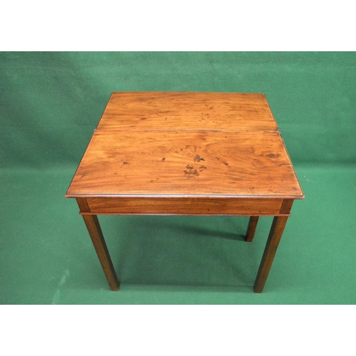 37 - 19th century mahogany fold over tea table the top opening to reveal polished surface, standing on sq... 