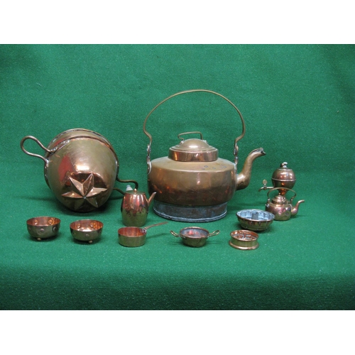 384 - Group of copperware to include: large kettle, two handled lidded pan, small samovar, chocolate pot, ... 