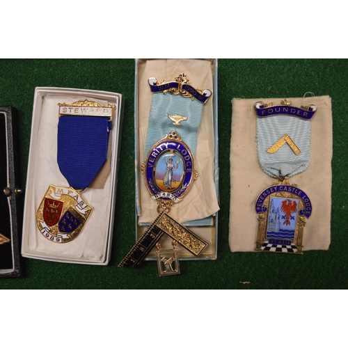 398 - Case of Masonic regalia to include: quantity of literature, apron, gloves and a number of silver, gi... 