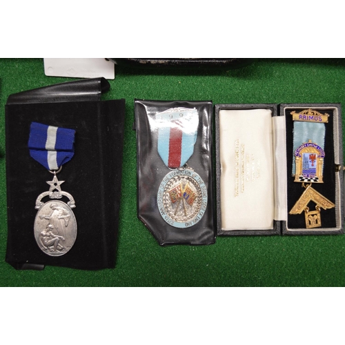 398 - Case of Masonic regalia to include: quantity of literature, apron, gloves and a number of silver, gi... 