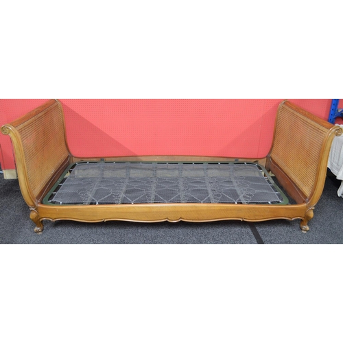 4 - Late 20th century Bergere single sleigh bed having double caned head and foot boards and metal sprin... 