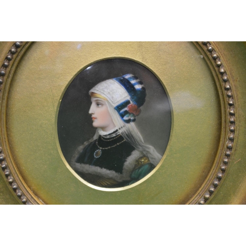 404 - Pair of 19th century oval enamelled miniature portraits on porcelain of young ladies in oval glazed ... 