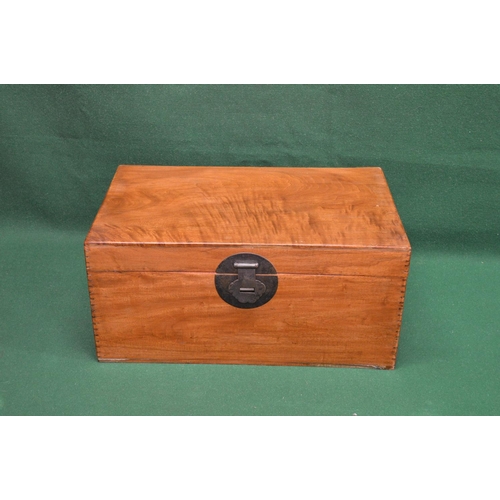 45 - 20th century camphor wood chest having side carrying handles and brass clasp, the top opening to rev... 