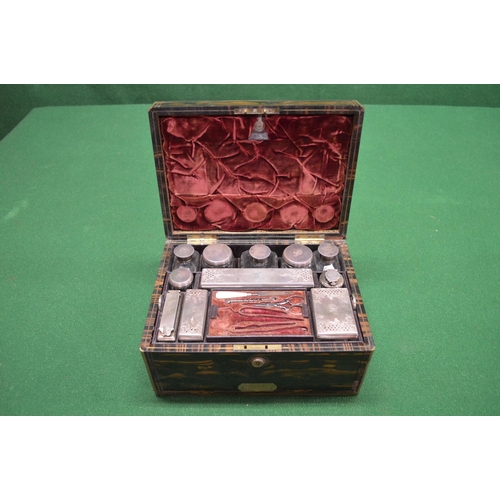 487 - Coromandle wood brass inlaid travelling vanity box with original outer leather case (af) the top ope... 