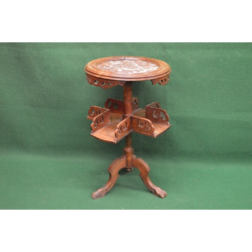 5 - Marble topped circular book standing having lower tier, standing on three cabriole style legs ending... 