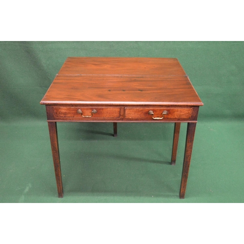 52 - 19th century mahogany fold over tea table the top opening to reveal polished surface over two drawer... 