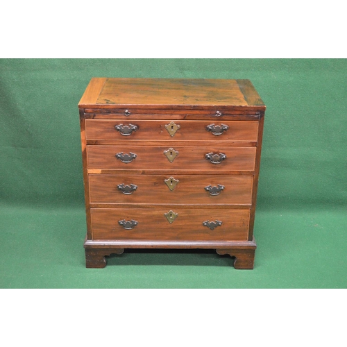 53 - 19th century mahogany chest of drawers having brushing slide over four long graduated drawers, stand... 