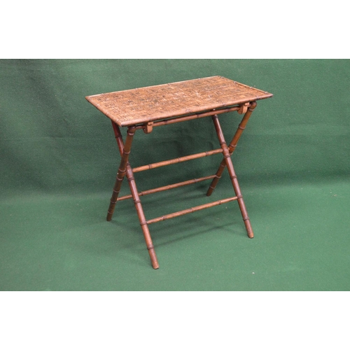 56 - Rectangular folding occasional table of simulated bamboo construction with woven matted top - 28.25