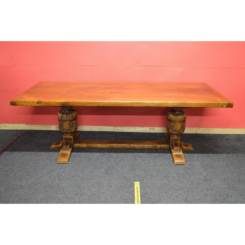 69 - 20th century oak refectory dining table having three plank top with cleated ends supported on carved... 