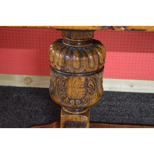 69 - 20th century oak refectory dining table having three plank top with cleated ends supported on carved... 