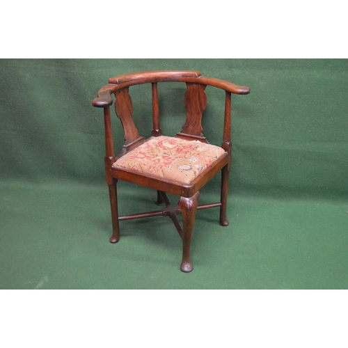 73 - 19th century mahogany corner chair having curved back supported by outward tapering columns and soli... 