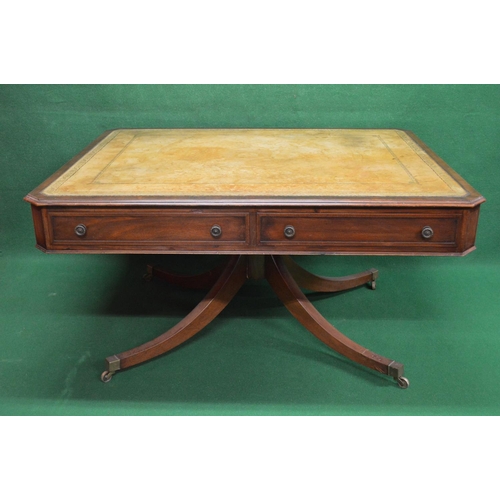 85 - Mahogany library table having leather insert top with gilt tooling and cut corners with two short dr... 