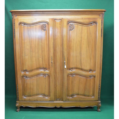 89 - 20th century walnut armoire having two panelled doors opening to reveal hanging space and shelves, s... 