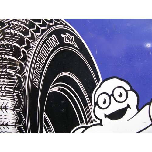 115 - Shield shaped enamel Michelin sign featuring a jolly Bibendum and ZX tyre, white, black and yellow o... 