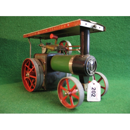 202 - Mamod steam tractor with spirit burner, steering column and box (safety valve, filler plug and drive... 