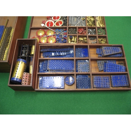 205 - Collection of 1930's blue and gold Meccano and two electric motors contained in a wooden chest with ... 