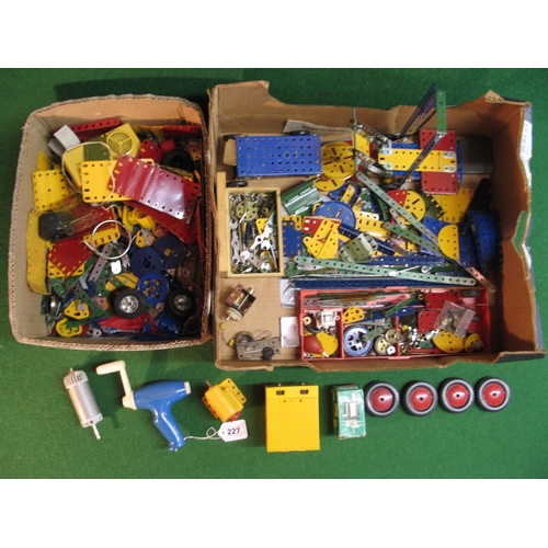 227 - Two boxes of assorted Meccano parts and motors