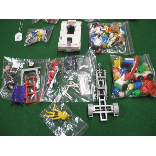 310 - Box of assorted 1970's/1980's Playmobile items to include: racing car, motorcycle, boat trailer, din... 