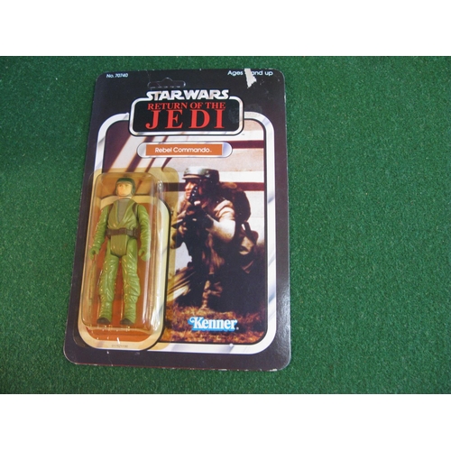 321 - Star Wars Return Of The Jedi Rebel Commando carded figure on a 65 back.  Bubble yellow but no dents ... 