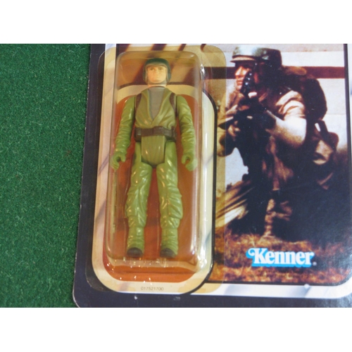 321 - Star Wars Return Of The Jedi Rebel Commando carded figure on a 65 back.  Bubble yellow but no dents ... 