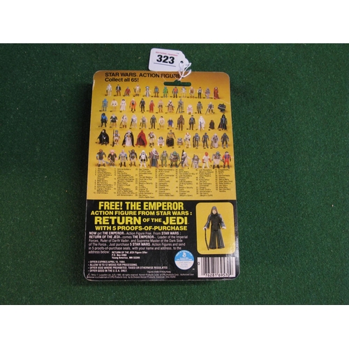 323 - Star Wars Return Of The Jedi Logray (Ewok-Medicine Man) carded figure on a 65 back.  Bubble yellow, ... 