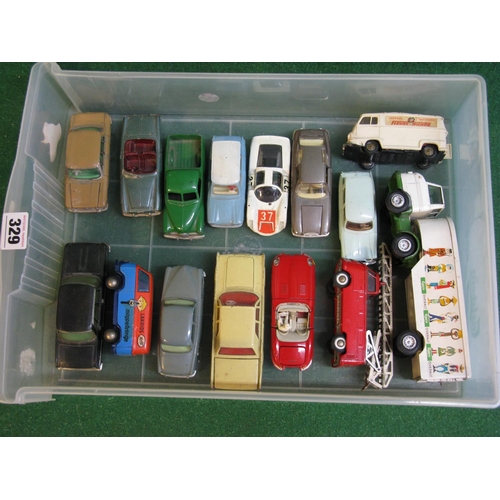 329 - Mixed lot of approx fifteen diecast and plastic model vehicles from: Tekno, Norev, Politoys, Solido,... 