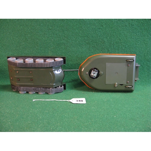 340 - Louis Marx & Co. Ltd Swansea: cap firing tank and military hovercraft, both battery operated, of met... 