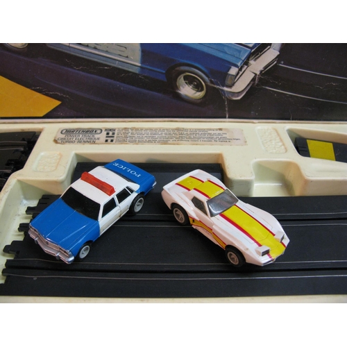 342 - Matchbox Powertrack Race & Chase set with Police car and Corvette Stingray, boxed