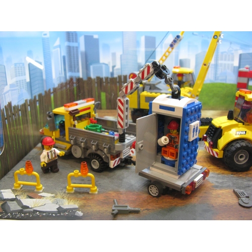 354 - Lego City interactive shop display with lighting and sounds (on/off switch to rear) and featuring a ... 