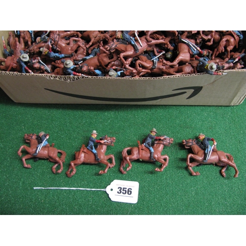 356 - Large quantity of Britains plastic mounted American soldiers on galloping horses, some on 'grass' ba... 