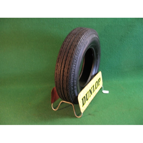 37 - Metal Dunlop Tyre display stand complete with a Dunlop D75 Crossply 520x10 new tyre - stand 15