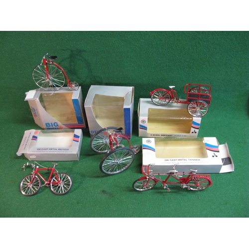 372 - Five boxed metal Made In Taiwan 1:10 scale models of bicycles through the ages from a Penny Farthing... 