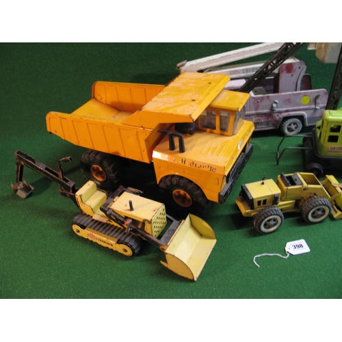 398 - Large Tonka dump truck, front loader, tracked excavator and Snorkel fire engine together with a whee... 