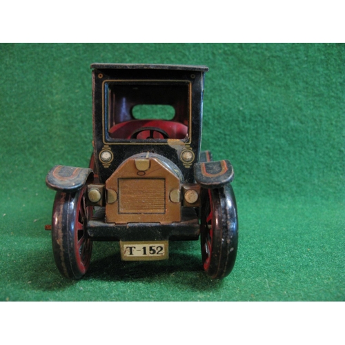 409 - Friction drive (with handbrake) tinplate model of an early 20th century Sedan, Made In Japan - 6.5