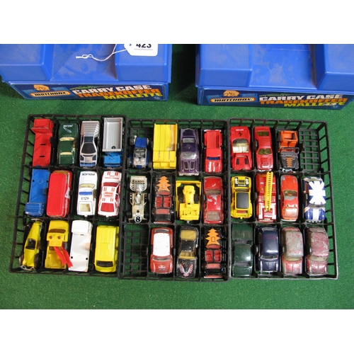 423 - Two Matchbox carry cases with three trays and approx thirty four diecast vehicles from Matchbox, Cor... 