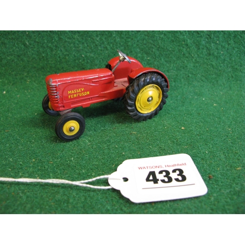 433 - 1966-1971 Dinky 300 Massey Ferguson tractor with cast metal yellow rear wheels