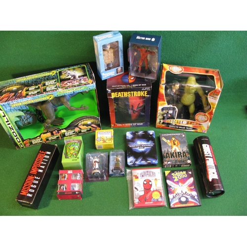 440 - Two boxes of Sci-Fi/comic/film/tv/promotional items to include: battery powered Godzilla, Dr Who cha... 