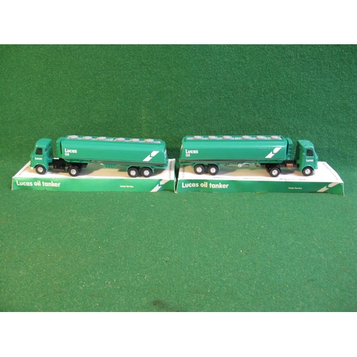 448 - Two promotional Lucas Oil AEC tankers made by Dinky in 1977 with original card bases (bubble tops ha... 