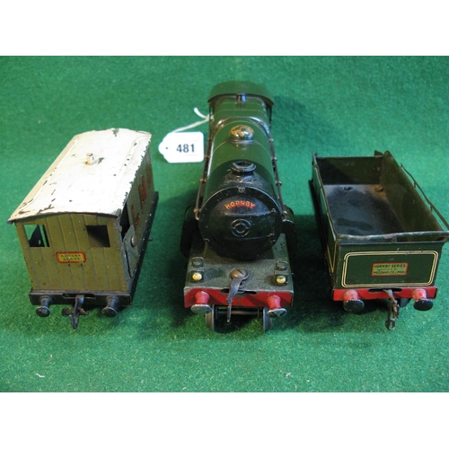 481 - Hornby O gauge clockwork 4-4-2 locomotive Lord Nelson in lined green together with a six wheel, coal... 