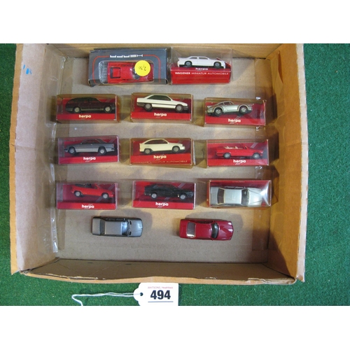 494 - Thirteen HO scale plastic 1980's cars Made In Germany by Herpa, eleven are boxed