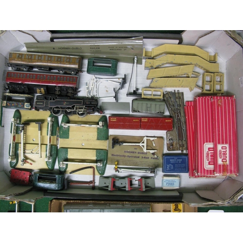 518 - Two boxes of Hornby Dublo accessories and spares to include: boxed points, signals, locomotive body ... 