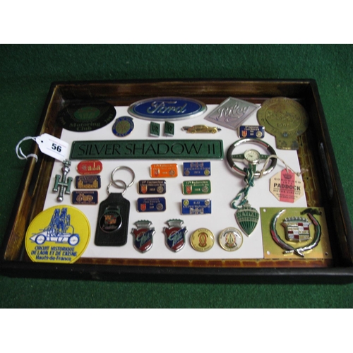 56 - Tray of car motifs, rally plaques and badges, Goodwood Revival steering wheel clock, tie pin etc