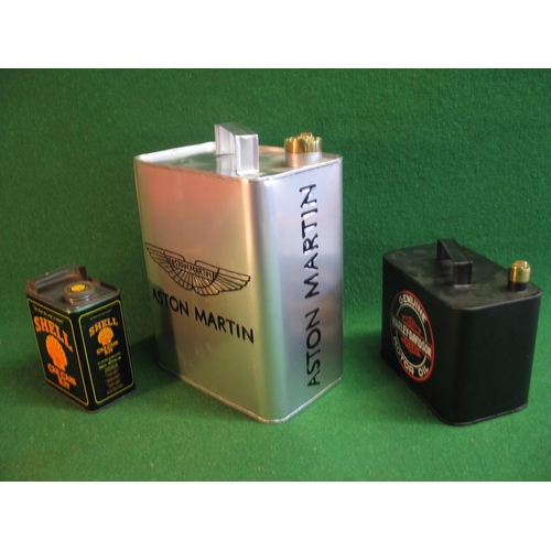 79 - Two reproduction fuel cans for Aston Martin and Harley-Davidson together with a Shell Car Care kit c... 