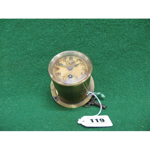 119 - American 8 day angled brass dashboard clock for a Veteran vehicle, with key