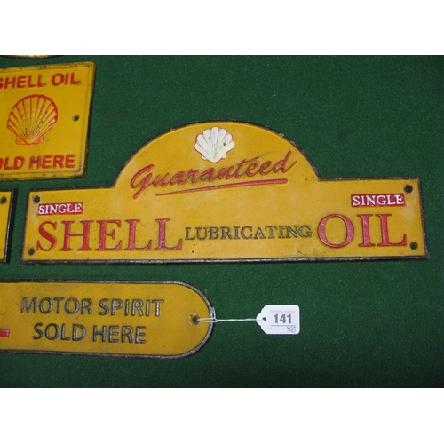 141 - Six modern cast iron reproduction signs for Shell, Esso and Michelin - widest 19.5