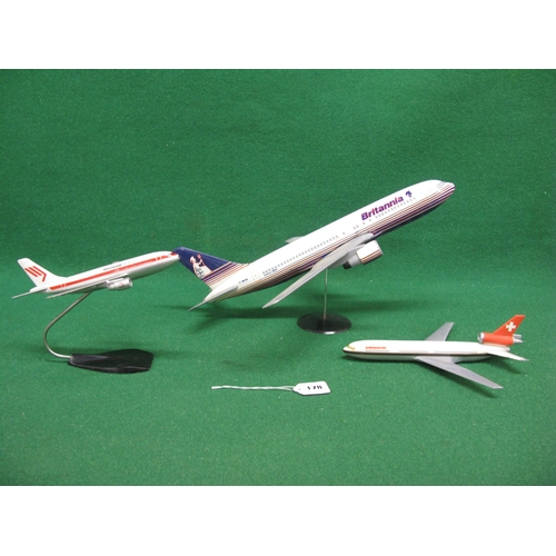 178 - Three plastic desktop airline models with two stands to comprise: 1:100 scale Boeing 767 in Britanni... 