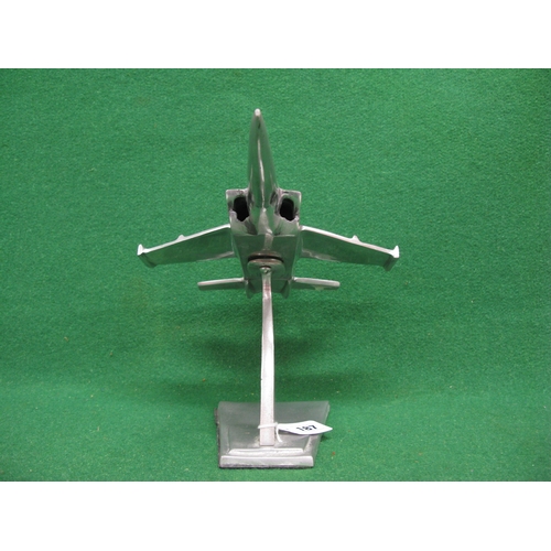 187 - Polished alloy desk ornament of a futuristic jet fighter, plane is 15