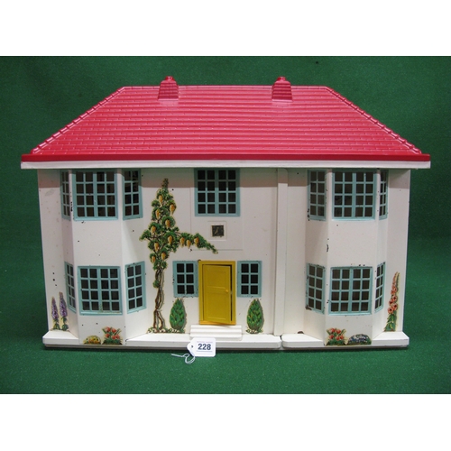 228 - Double fronted wood and tinplate dolls house with plastic roof and interior lights together with a q... 