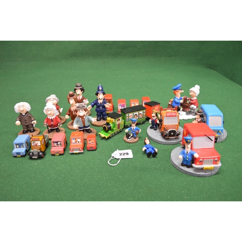 229 - Quantity of 1990's Postman Pat figurines and vehicles, a Trotters van, alarm clock and a signed phot... 