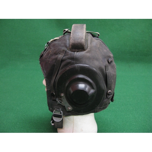 243 - Leather flying helmet with alloy buckles and clips, built in speaker and a curved sponge buffer on t... 